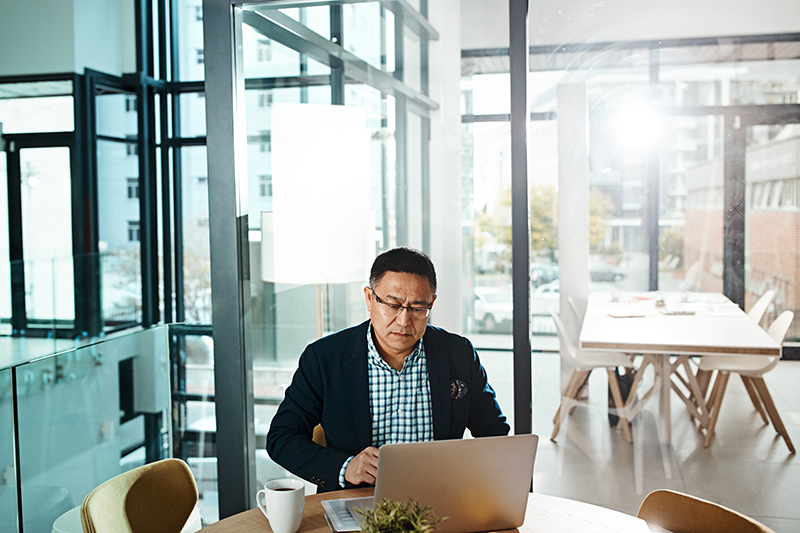 Asian,Man,,Laptop,And,Online,In,Office,,Human,Resources,And